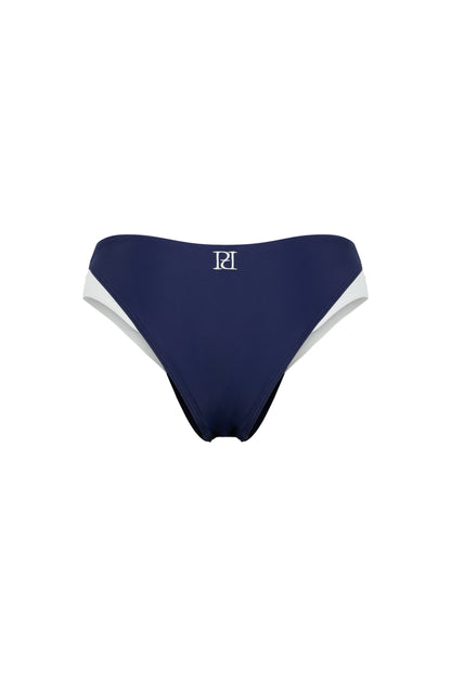 Back view of the Monaco navy and ivory bikini bottom with signature embroidery, classic coverage and ivory side accents on a white background.