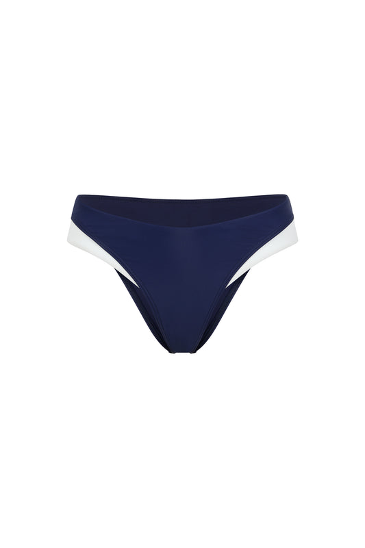 Monaco navy and ivory bikini bottom with low-rise fit, ivory side accents and premium European swim fabric on a white background.