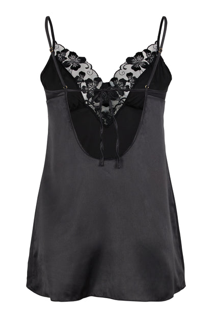 Back view of the Valerie black satin chemise with adjustable satin straps, soft Italian satin and subtle gold-tone hardware on a white background.