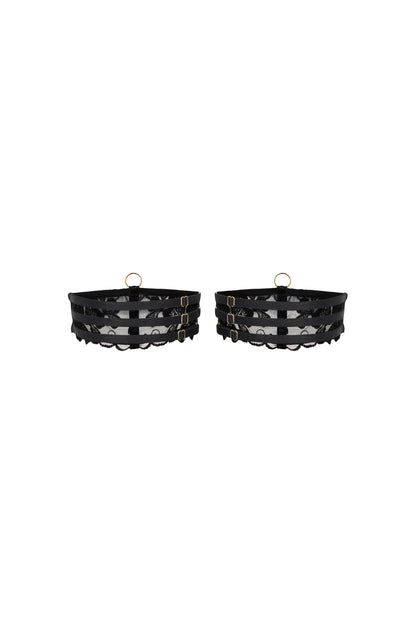 Back view of the Valerie black thigh garters with sheer embroidered tulle, adjustable straps and gold-tone hardware on a white background.