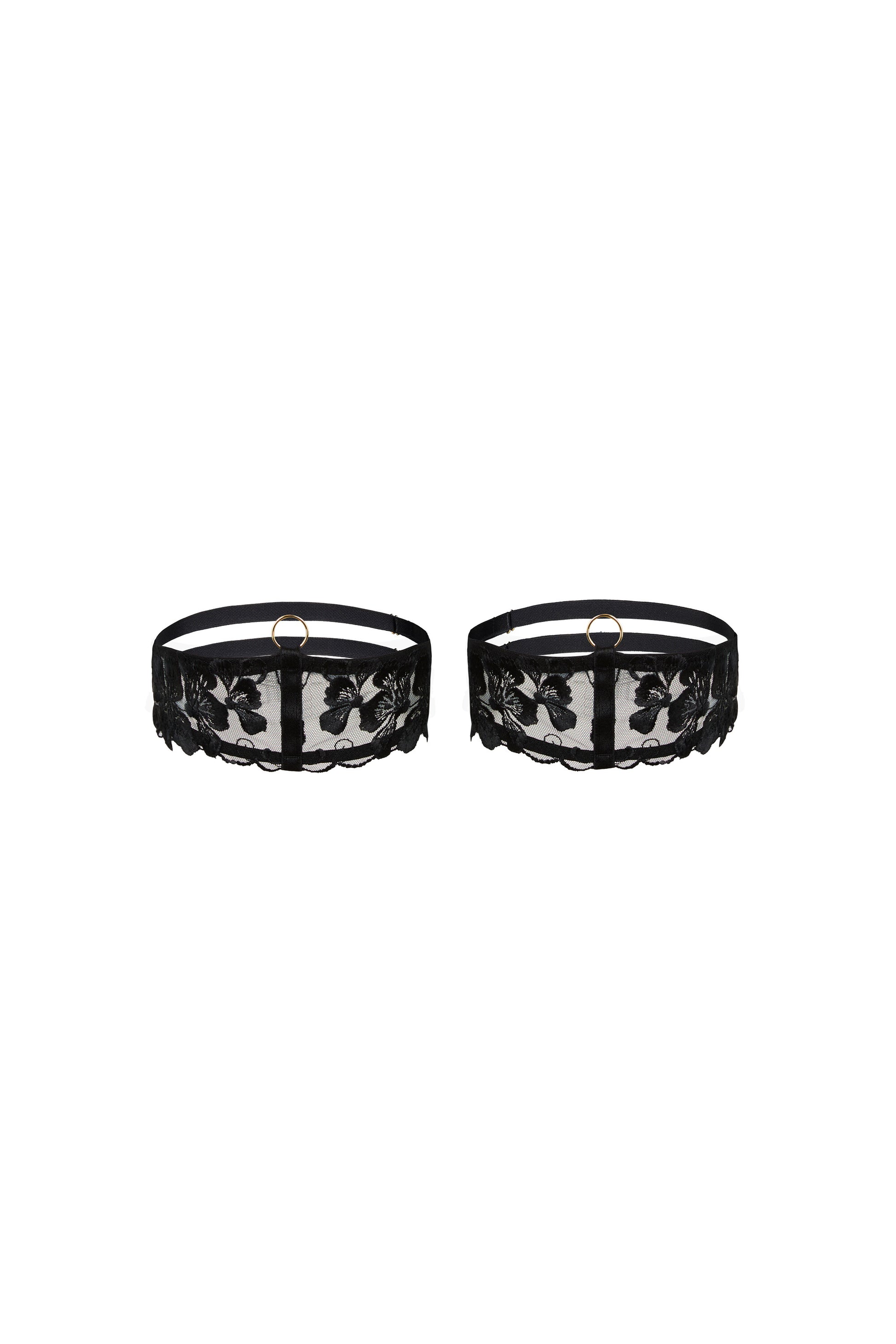 Valerie black thigh garters with Swiss embroidery over sheer tulle, adjustable straps and gold-tone hardware on a white background.