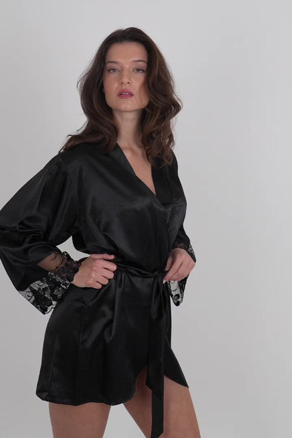 Valerie black floral embroidered robe in satin and tulle, worn by model, 360 degree view against light grey backdrop.